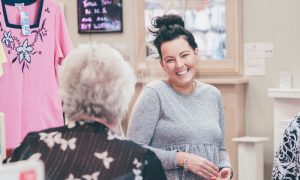 Trader and customer at The Forge Market